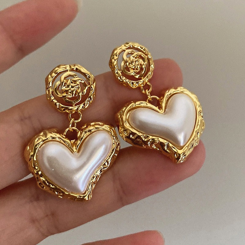 Design high-end and caring earrings for women with Xia Xiaozhong temperament and spicy girl accessories. Fashion ear accessories